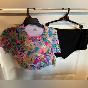 Pink and black swim suit